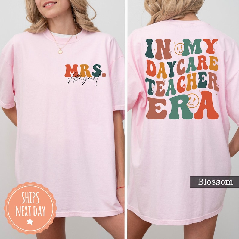 a woman wearing a pink t - shirt that says, i'm my day