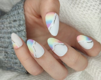 Handmade, reusable and customizable “Press On” nails. Pastel rainbow pattern.