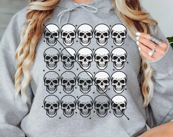 May include: A light gray hoodie featuring a grid of white skull graphics. The hoodie has a drawstring hood and long sleeves. The text "Muscles and Math" is in the upper left corner. The words "sport grey" are at the bottom right.
