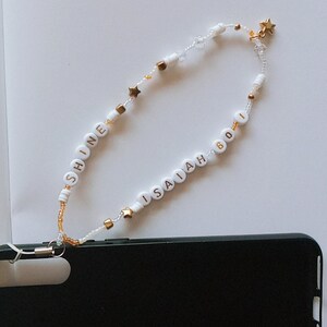 Pulsera de joyería telefónica de vidrio y rocallas con dije de estrella | Levántate y brilla