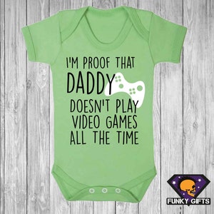 I&#39;m Proof Daddy Doesn&#39;t Play Video Games All The Time Baby Vest, Rompersuit or Bib