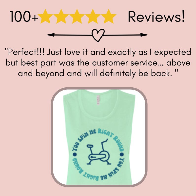 May include: A light green sleeveless shirt with the text "You Spin Me Right Round" encircling a blue graphic of a stationary exercise bike. The shirt has a rounded neckline.