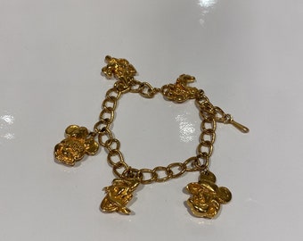 Disney gold tone charm bracelet