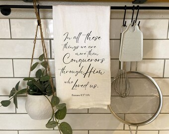 More than Conquerors. Romans 8:37. Flour Sac Kitchen Towel. Farmhouse Kitchen Décor. Cute Christian Gift. Hand Lettered Bible Verse