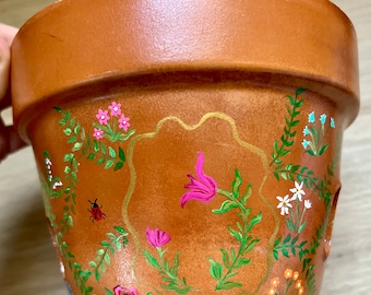 Maceta de terracota para jardín pintada a mano