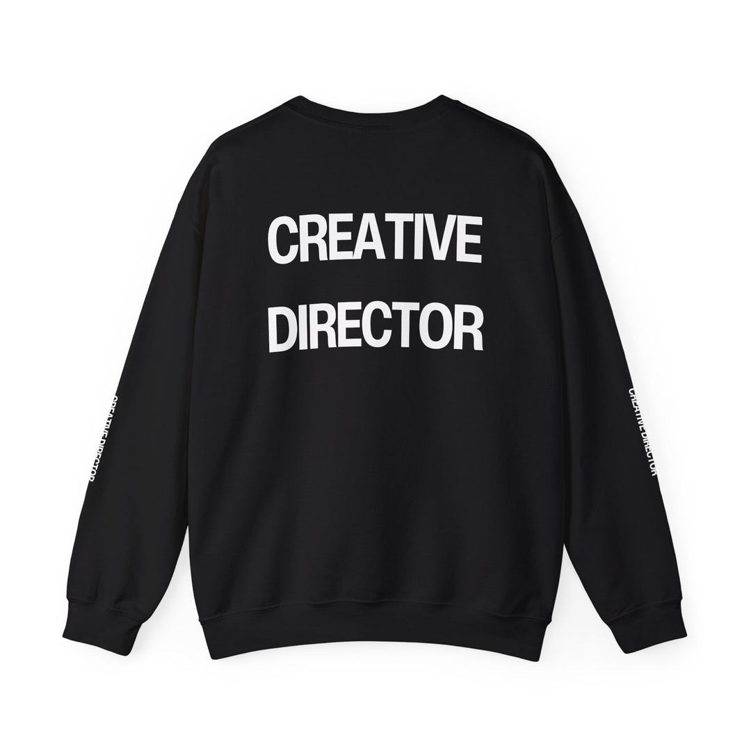 Merch Director Background CREATIVE DIRECTOR Brand Statement-maker Unisex Heavy Blend™ Crewneck ...