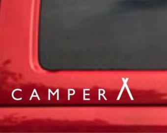 May include: White vinyl decal with the text "CAMPER" and a stylized tent symbol on a red vehicle.