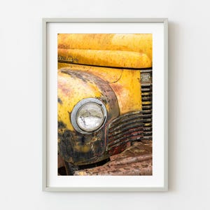 Rusted yellow truck headlight | Wall Art