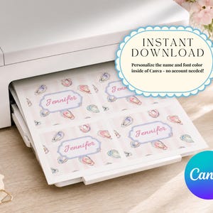 May include: A printer is shown printing sheets of paper with a repeating pattern of oyster illustrations and the name "Jennifer" in a decorative frame. The sheets are printed on a pink and white striped background. The image also includes text that says "Instant Download" and "Canva".