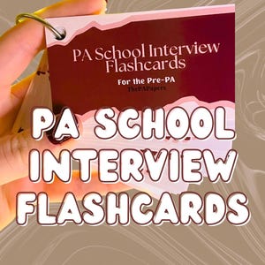 May include: A set of flashcards for PA school interview preparation. The cards are held together by a metal ring. The text "PA School Interview Flashcards" is prominently displayed in a white, outlined font. The background is a gradient of brown and tan.