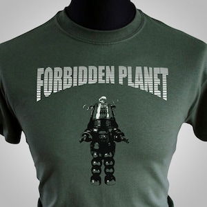 May include: A dark green t-shirt with a white graphic print of a robot with the text "Forbidden Planet" above it.