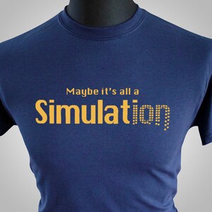 May include: A navy blue t-shirt with the text "Maybe it's all a Simulation" printed in yellow.