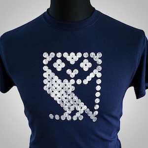 May include: A navy blue t-shirt with a white pixelated owl design. The owl is stylized and has a distressed look.