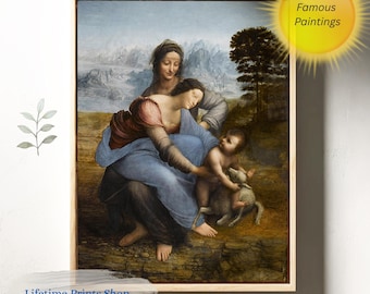 May include: A framed print of a Renaissance painting featuring three figures. The central figure wears a blue robe and holds a child, while another woman stands behind them. The artwork is set against a landscape with a tree. The print is labeled "Lifetime Prints Shop" and "Famous Paintings."