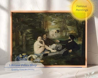 May include: Framed print of a famous painting depicting a picnic scene in a forest. The artwork features several figures, including a nude woman, and is set against a backdrop of trees. The frame is a light brown color. The text "Famous Paintings" and "Lifetime Prints Shop" are visible.