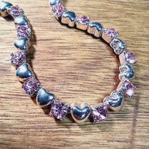Pink rhinestone and hearts tennis bracelet vintage Avon 7 inch jewelry gift for women