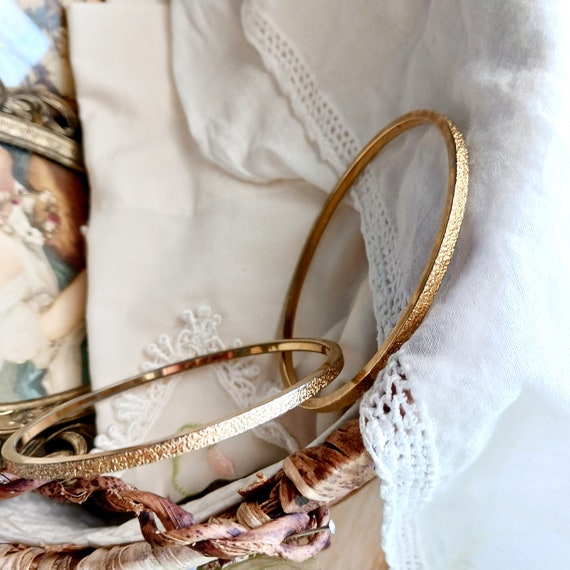 Set of 2 signed Monet gold tone bangle bracelets,… - image 1