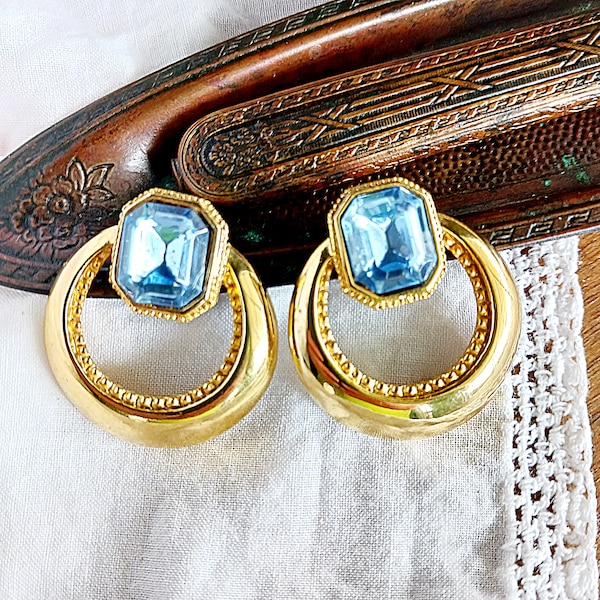 Vintage blue rhinestone and gold tone circle earrings, faux topaz doorknockers, mid-century large crystal studs, 60s or 80s retro jewelry