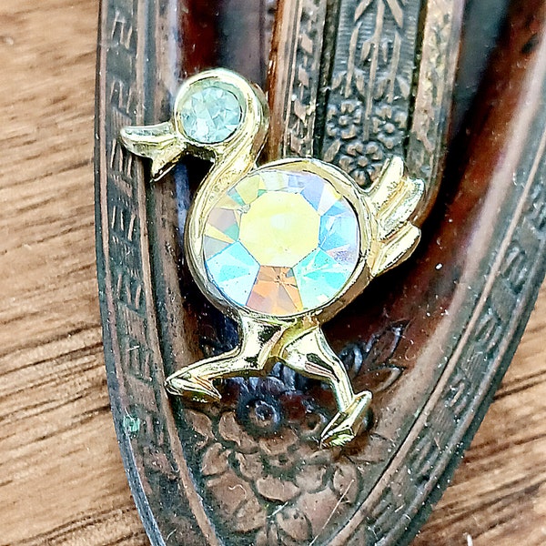 Vintage duck pin with very large aurora borealis rhinestone belly, huge ab crystal abdomen gold tone goose, swarovski eye tummy bird brooch