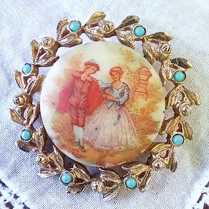 Painted cameo Victorian revival brooch jean fragonard courting couple scene porcelain pin French rococo art gold jewelry romantic pastel