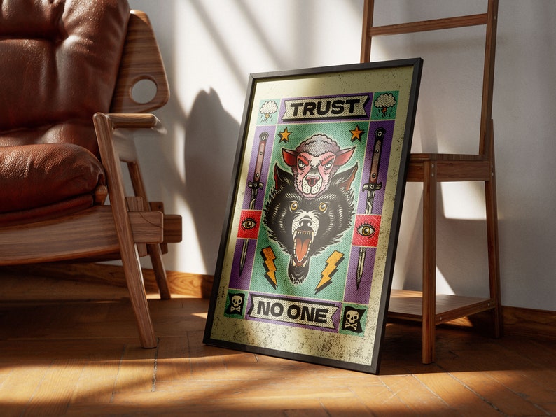 May include: A framed print with a colorful illustration of a wolf's head with a sheep's head inside. The print has the text "TRUST NO ONE" in a banner at the bottom.