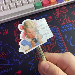May include: A sticker featuring a girl on the phone with the text "That wasn't very cash money of you".