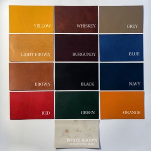 May include: A color palette featuring leather swatches in various shades. Colors include yellow, whiskey, grey, light brown, burgundy, blue, brown, black, navy, red, green, orange, and white brown with text labels.