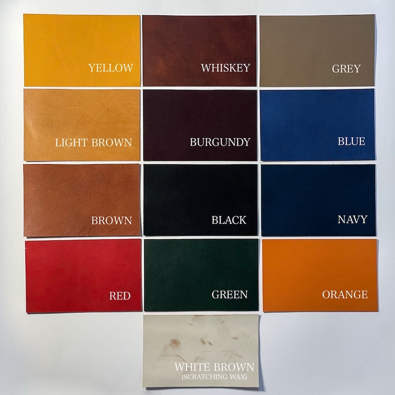 May include: A color palette featuring leather swatches in various shades. Colors include yellow, whiskey, grey, light brown, burgundy, blue, brown, black, navy, red, green, orange, and white brown with text labels.