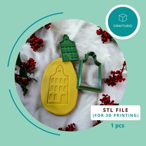 May include: Green plastic cookie cutters in the shape of a Dutch house and a rectangle. The cutters are on a white surface with red berries. The text "STL FILE (FOR 3D PRINTING) 1 pcs" is below the cutters.