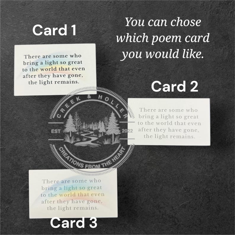 May include: Three white cards with a poem about light are displayed on a dark background. The cards are labeled "Card 1", "Card 2", and "Card 3". The text "You can chose which poem card you would like" is also visible.