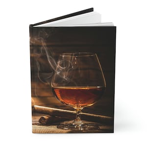 May include: A glass of amber-colored liquor sits on a wooden surface with a lit cigar. Smoke curls up from the cigar, creating a hazy atmosphere.