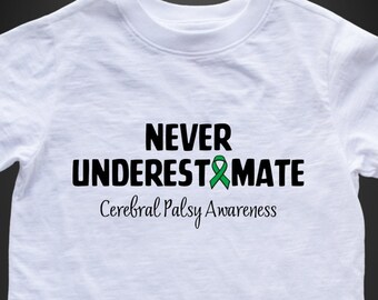 May include: White t-shirt with the text "NEVER UNDERESTIMATE" and a green ribbon. The text "Cerebral Palsy Awareness" is below the ribbon.