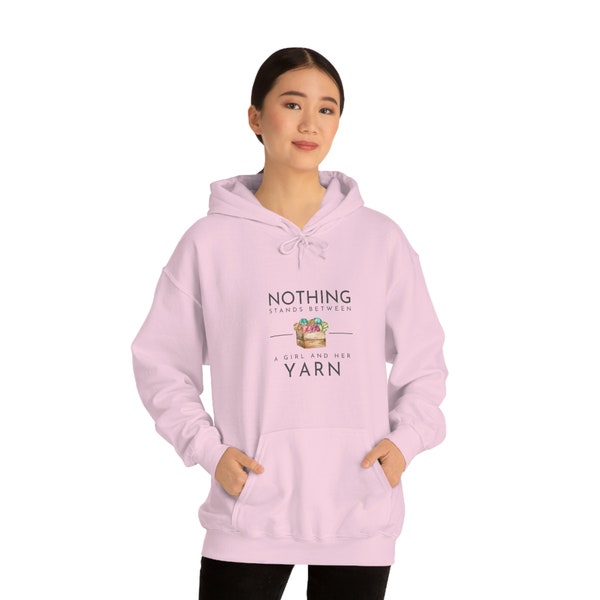 Nothing Stands Between A Girl and Her Yarn, Stay Warm and Cozy with this Trendy Women's Hooded Sweatshirt, Humorous Graphic Slogan Included!