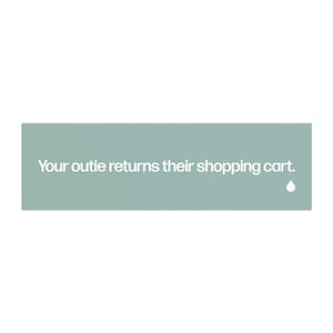 May include: A rectangular sign in a light teal color with the text "Your outie returns their shopping cart." in white. A small white droplet graphic is in the lower right corner. The background is white.