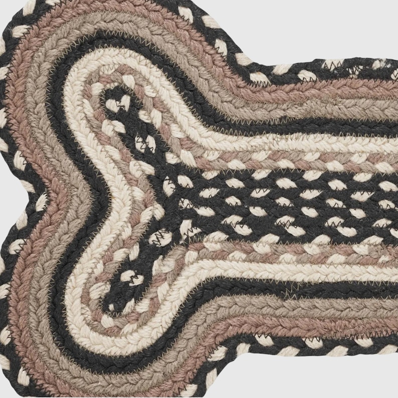 Farmhouse Style Braided Pet Mat with natural jute woven craftsmanship. A durable dog bone shaped placemat that protects floors adds rustic charm and enhances eco friendly kitchen and pet decor.