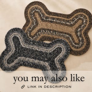 two decorative dog bone-shaped rugs, one in black and one in brown, placed on a beige background.