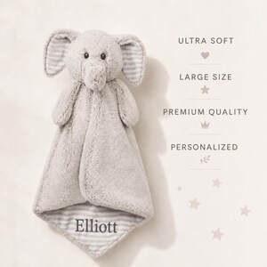 May include: A gray plush elephant security blanket with striped inner ears and a striped bottom corner featuring the embroidered name Elliott. Text on the right reads: ULTRA SOFT, LARGE SIZE, PREMIUM QUALITY, PERSONALIZED.