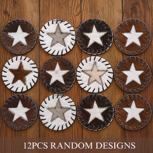 a collection of 12 coasters with various star designs, arranged on a wooden surface.