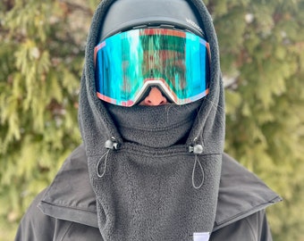 Capuche de ski noire pouvant s'adapter au casque, à la cagoule et au tour de cou. Cagoule de casque !