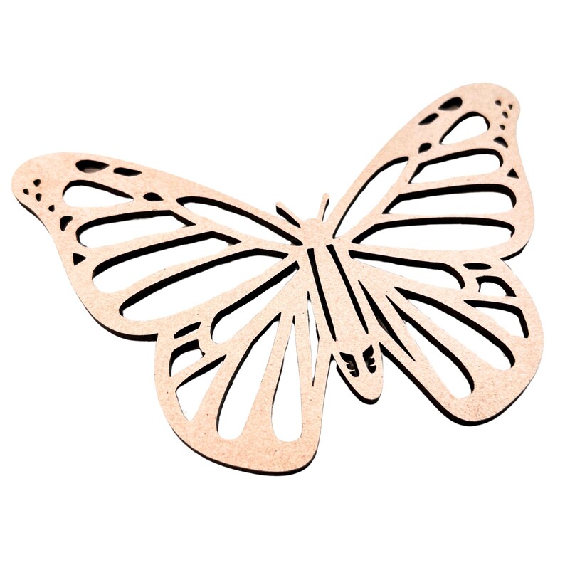 May include: A wooden butterfly cutout with intricate details. The butterfly is light brown and has a delicate, airy design.