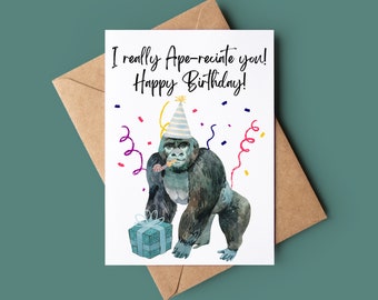 May include: A birthday card with a watercolor illustration of a gorilla wearing a party hat and holding a party blower. The card says "I really Ape-reciate you! Happy Birthday!"