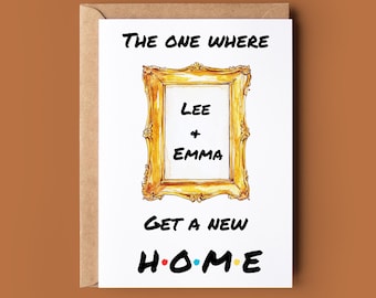 May include: A white card with a gold frame illustration and the text "The One Where Lee + Emma Get A New H.O.M.E."
