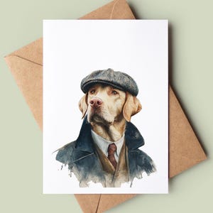 May include: Watercolor illustration of a Labrador Retriever wearing a tweed cap, suit jacket, and tie. The dog is depicted on a white card, resting on a brown envelope, with a light green background.