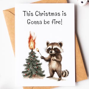 Carte de joyeux Noël raton laveur - jolie carte de Noël raton laveur - This Xmas Is Gonna Be Fire - carte d'amant de raton laveur - carte de jeu de mots drôle - carte de Noël de blague