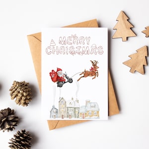 Tarjeta de Navidad divertida de Santa - Tarjeta de Feliz Navidad - Tarjeta de felicitación de acuarela - Tarjeta de Navidad de broma - Tarjeta linda de Santa - Santa en un ciclomotor