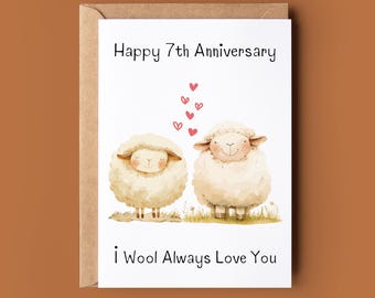 May include: A white card with a brown envelope. The card has a cartoon image of two white sheep with pink hearts above them. The text on the card reads "Happy 7th Anniversary" and "I Wool Always Love You".