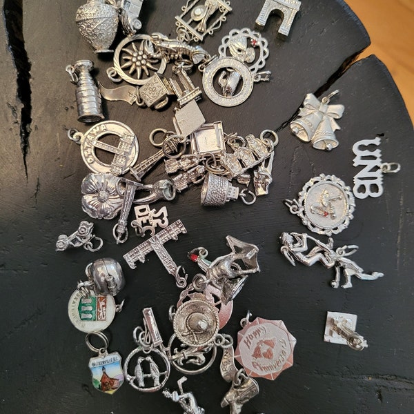 1Vintage sterling silver charms, bracelet's, pendants,  sold each, curling, Christmas, bell, Adam and Eve, Toronto,table,bowling, typewriter