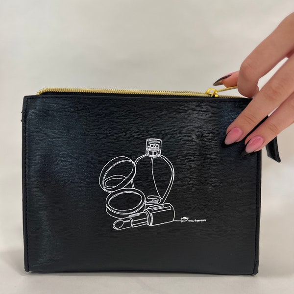 Graphic cosmetic bag, this small bag is perfect for keeping makeup organized. makes a perfect gift .