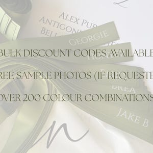 May include: A collection of light green name tags with white text, fanned out over a white surface. The tags display names and the text "BULK DISCOUNT CODES AVAILABLE", "FREE SAMPLE PHOTOS (IF REQUESTED)", and "OVER 200 COLOUR COMBINATIONS!"