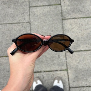 Vintage Inspired Oval Sunglasses | Slim Retro Sunglasses | Classic Glasses for Men & Women | Black Frame with Brown Lenses
